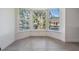 Bright room featuring a large bay window with views of the neighborhood, complemented by tile flooring at 6 Harbor Cove St, Safety Harbor, FL 34695