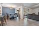 Open-concept dining area with tile flooring and sliding glass doors to the backyard at 6 Harbor Cove St, Safety Harbor, FL 34695