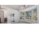 The dining room features bright windows and natural light at 6 Harbor Cove St, Safety Harbor, FL 34695