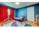 bedroom featuring a bed, a window, storage cabinets, and colourful rug at 604 Knollwood Dr, Largo, FL 33770