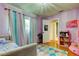 Bedroom with colourful decor and large windows, a space of dreams and imagination at 604 Knollwood Dr, Largo, FL 33770