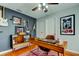 Well-decorated home office with electric guitars on the wall at 604 Knollwood Dr, Largo, FL 33770