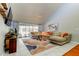 Spacious living room with large windows and stylish decor, perfect for gatherings at 604 Knollwood Dr, Largo, FL 33770