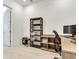 Bright office with work space, shelving and laminate floors at 6057 Marsh Trail Dr, Odessa, FL 33556