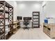 Bright home office with built-in desk, shelving, and modern decor perfect for a productive work environment at 6057 Marsh Trail Dr, Odessa, FL 33556