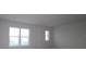 Bedroom with a window, featuring a neutral palette and ample natural light at 640 Allora Ave, Nokomis, FL 34275