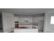 Spacious kitchen with white cabinets, awaiting finishing touches and appliances at 640 Allora Ave, Nokomis, FL 34275