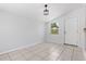 Inviting dining area with tile flooring and modern lighting fixtures. Ready for entertaining at 675 69Th S Ave, St Petersburg, FL 33712