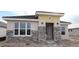 Inviting single Gathering home features stone veneer accents and a covered front entrance at 699 Allora Ave, Nokomis, FL 34275