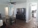 Open-concept living room flowing into the kitchen at 702 Cypress Pl, Sun City Center, FL 33573