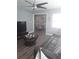Spacious living room, seamlessly connecting to the dining area, offers a perfect blend of comfort at 702 Cypress Pl, Sun City Center, FL 33573