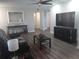 Spacious living room offers open layout and neutral paint at 702 Cypress Pl, Sun City Center, FL 33573