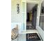 Inviting entryway with a decorative welcome mat and glass paneled door at 7427 Banner St, New Port Richey, FL 34653