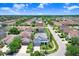 Aerial view of a lovely neighborhood with well-maintained houses and manicured lawns at 7515 Dragon Fly Loop, Gibsonton, FL 33534