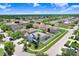 Neighborhood aerial view showcasing the houses with palm tree landscaping at 7515 Dragon Fly Loop, Gibsonton, FL 33534