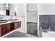 Beautiful bathroom featuring a jacuzzi, tile flooring, and double vanity at 7515 Dragon Fly Loop, Gibsonton, FL 33534
