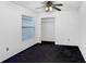 Bright bedroom with a closet, featuring a ceiling fan and a window at 7515 Dragon Fly Loop, Gibsonton, FL 33534