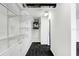 Walk-in closet with metal shelving units for storage at 7515 Dragon Fly Loop, Gibsonton, FL 33534