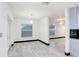 Bright dining area with pendant light, tile flooring, and access to the patio at 7515 Dragon Fly Loop, Gibsonton, FL 33534
