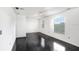 Bright living room with hardwood floors, recessed lighting, and natural light at 7515 Dragon Fly Loop, Gibsonton, FL 33534