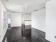 Spacious living room with hardwood floors and track lighting, with natural light at 7515 Dragon Fly Loop, Gibsonton, FL 33534