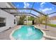 Beautiful pool and enclosed lanai, perfect for outdoor enjoyment and relaxation at 7515 Dragon Fly Loop, Gibsonton, FL 33534