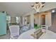 Open-concept dining area flows seamlessly into the living room, creating an inviting space at 11044 Spring Point Cir, Riverview, FL 33579