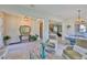 Bright foyer leads to the dining and living areas, showcasing the home's open layout at 11044 Spring Point Cir, Riverview, FL 33579