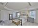 Spacious main bedroom boasting tray ceilings, soft carpet, and bright natural light, creating a serene retreat at 11044 Spring Point Cir, Riverview, FL 33579