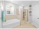 Beautiful bathroom features a soaking tub and an enclosed glass shower at 11295 Timber Grove Ln, Brooksville, FL 34613