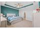 Spacious main bedroom features a trey ceiling, ceiling fan, and ensuite bathroom at 11295 Timber Grove Ln, Brooksville, FL 34613