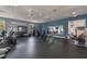 Spacious gym with modern equipment, mirrors, and ample space for workouts at 11317 Wickersley Pl, Tampa, FL 33625