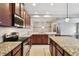 Spacious kitchen with granite countertops, stainless appliances, and plenty of cabinet space at 11317 Wickersley Pl, Tampa, FL 33625