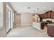 Open kitchen featuring stainless steel appliances and an eat-in island at 11317 Wickersley Pl, Tampa, FL 33625