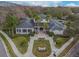 Aerial view of a large, elegant community center, called Lake House, with manicured landscaping at 11317 Wickersley Pl, Tampa, FL 33625