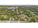 Enjoy this home's aerial view within a vibrant community, near a beautiful lake, and convenient city access at 1327 S Michigan Ave, Clearwater, FL 33756