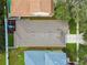 A high-angle shot capturing roof and playground; close to other homes in a Gathering-friendly neighborhood at 13310 Tiger Lilly Ln, Tampa, FL 33625