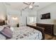 Comfortable bedroom with ensuite bathroom and walk-in closets at 13310 Tiger Lilly Ln, Tampa, FL 33625