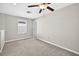 Bedroom with carpet floors, neutral walls, a window, and a ceiling fan at 13324 Willow Bluestar Loop, Riverview, FL 33579