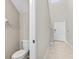 Convenient powder room off the entryway featuring a toilet and proximity to the home's front door at 13324 Willow Bluestar Loop, Riverview, FL 33579