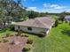 An aerial view showcases landscaping, roof and home's backyard at 1617 Leland Dr, Sun City Center, FL 33573