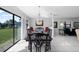 The dining room has lots of windows and view to backyard at 1617 Leland Dr, Sun City Center, FL 33573