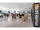Open-concept living and dining area featuring lots of natural light at 1617 Leland Dr, Sun City Center, FL 33573