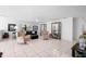 Bright and open living space with elegant decor and tile flooring at 1617 Leland Dr, Sun City Center, FL 33573