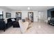 Inviting living room with tile flooring and decorative display cases at 1617 Leland Dr, Sun City Center, FL 33573