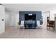 Open living space with tile flooring, a TV, and stylish furniture at 1617 Leland Dr, Sun City Center, FL 33573