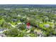 Lush landscaping surrounds this property, offering privacy and a scenic view from above of waterways nearby at 1628 Long Bow Ln, Clearwater, FL 33764
