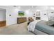 Spacious main bedroom with built-in shelving, fireplace and plush carpeting at 1628 Long Bow Ln, Clearwater, FL 33764