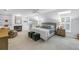 Bright and airy main bedroom with a fireplace, built-in bookshelves, and a ceiling fan at 1628 Long Bow Ln, Clearwater, FL 33764