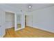 Bedroom with hardwood floors, closet and ceiling fan at 2201 Bay Club Cir, Tampa, FL 33607